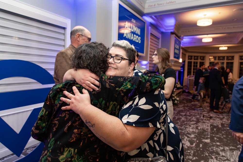Suzanne Zack hugs a friends